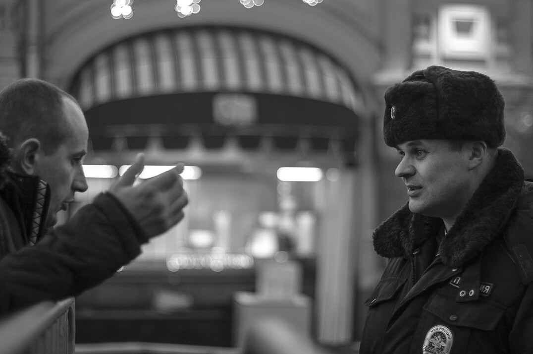 store manager talking to guard